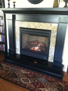 Gas fireplace as a focal point in townhouse.  
